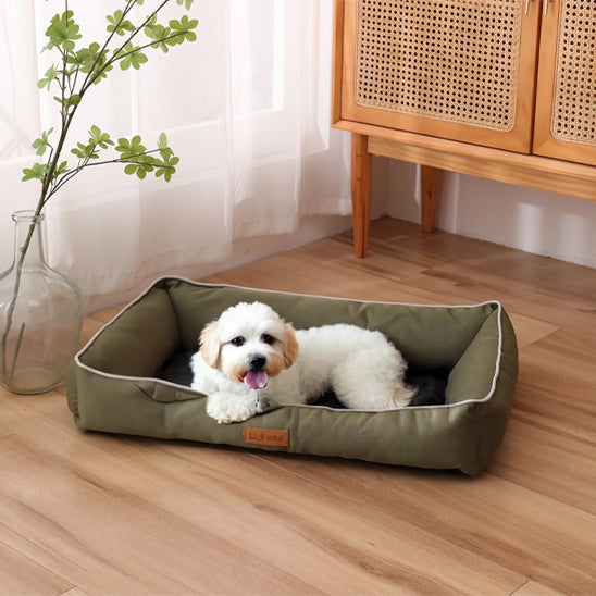 chien dort dans panier pour chien orthopédique deluxe vert