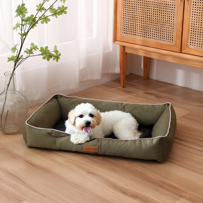 chien dort dans panier pour chien orthopédique deluxe vert
