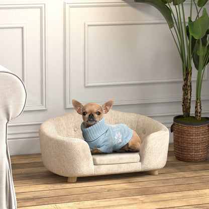 toutou assis dans canape sur pieds pour chien chaud