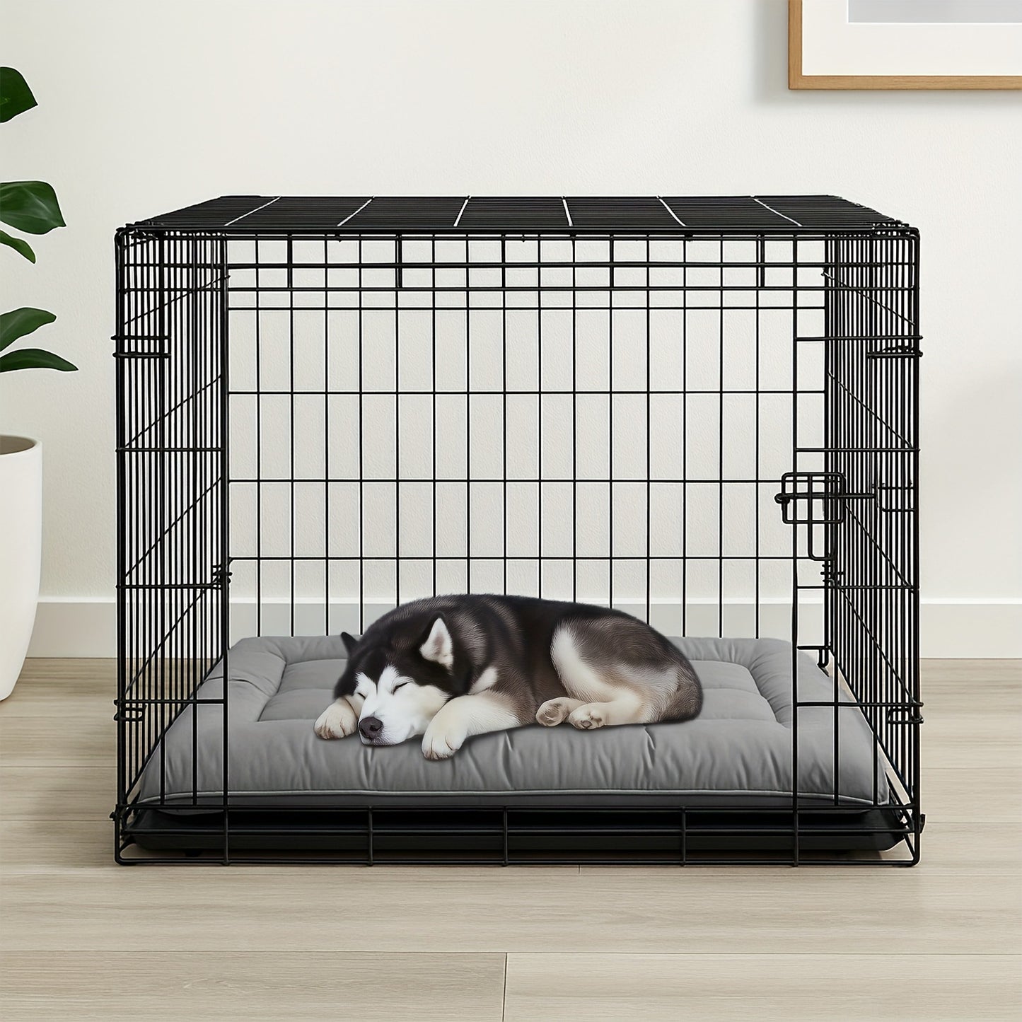 toutou sur matelas rafraichissant pour chien dans une cage
